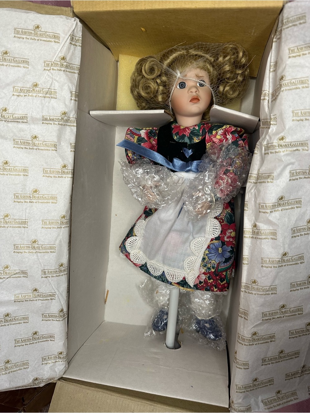 Ashton-Drake Galleries Porcelain Collectible Doll in Floral Dress w/ White Apron
